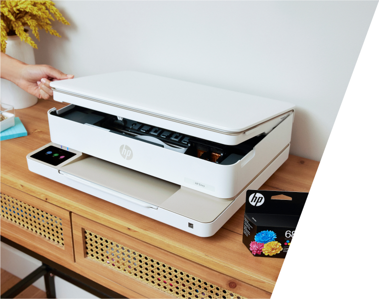 A printer and ink on a desk
